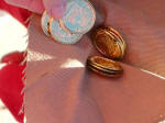 Rose Anne's fingers, rendering to Caesar what is Caesar's.